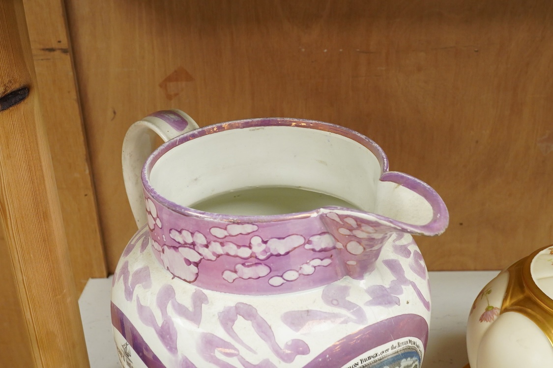 An early 19th century Sunderland pearlware and pink lustre jug, river weir bridge, 24cm high